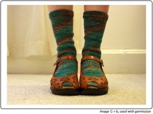 Rebecca's funky spiralled Submerge Socks, knit in SpaceCadet Creations yarn