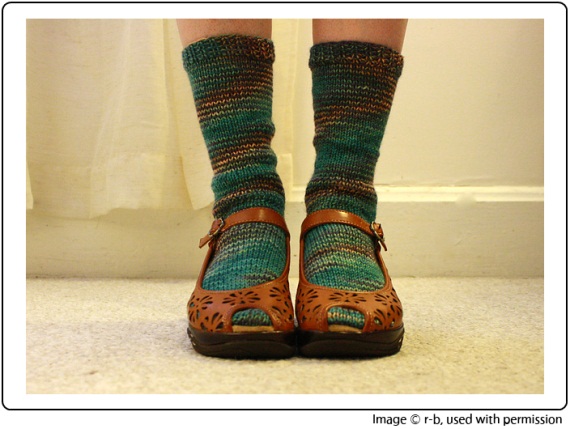 Rebecca's funky spiralled Submerge Socks, knit in SpaceCadet Creations yarn