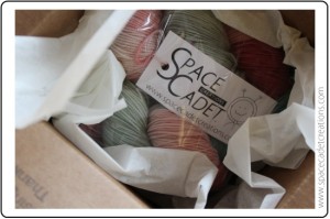 SpaceCadet Creations knitting and crocet yarn all wrapped up and packed in its box.